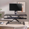 NEWSTAR Standing Desk Converter, Adjustable Sit to Stand Desk Riser, (90 x40 cm) - Durable Steel Frame, Up to 15 Kg Load Capacity, Custom Comfort Settings - Black | 91-DWS3402N