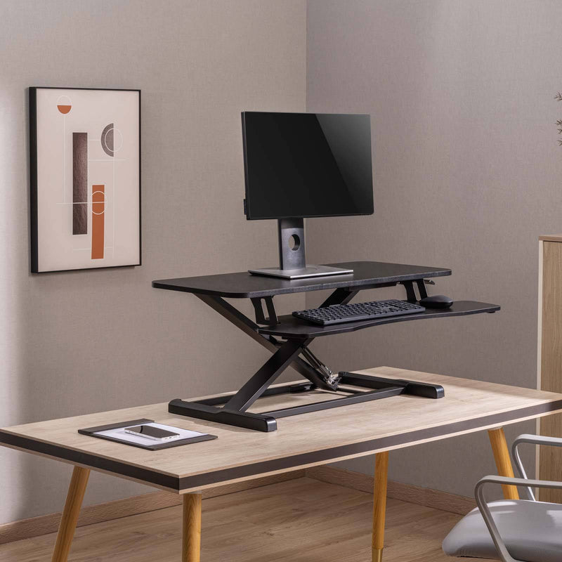 NEWSTAR Standing Desk Converter, Adjustable Sit to Stand Desk Riser, (90 x40 cm) - Durable Steel Frame, Up to 15 Kg Load Capacity, Custom Comfort Settings - Black | 91-DWS3402N