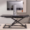 NEWSTAR Standing Desk Converter, Adjustable Sit to Stand Desk Riser, (90 x40 cm) - Durable Steel Frame, Up to 15 Kg Load Capacity, Custom Comfort Settings - Black | 91-DWS3402N