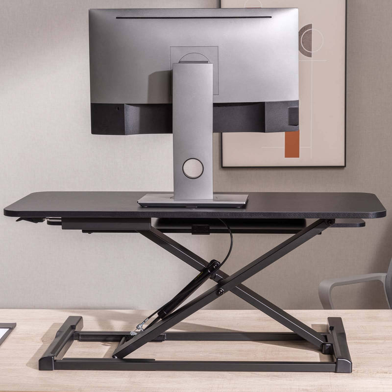 NEWSTAR Standing Desk Converter, Adjustable Sit to Stand Desk Riser, (90 x40 cm) - Durable Steel Frame, Up to 15 Kg Load Capacity, Custom Comfort Settings - Black | 91-DWS3402N
